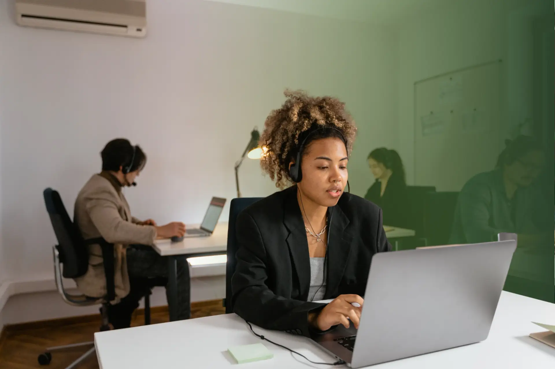 Hand presenting a digital security shield emblem, symbolizing IT Security and data protection.